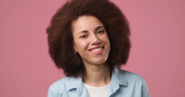 Smiling Attractive African American Woman Looking Mirror Standing Pink Background — Stock Video