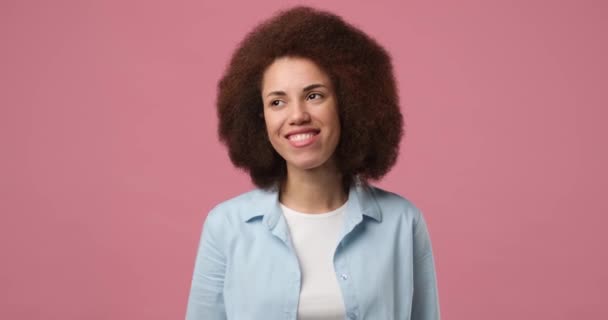 Smiling Attractive African American Woman Winks Looking Camera Standing Pink — Vídeos de Stock