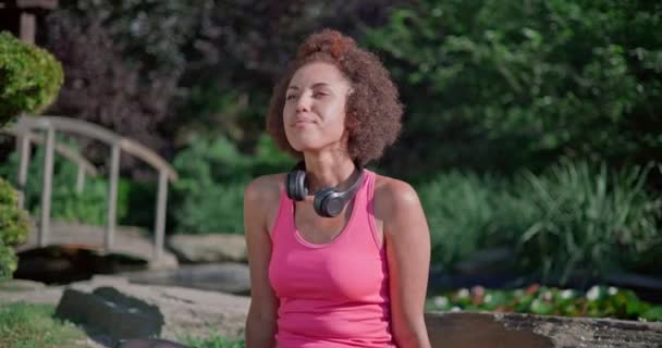 Happy Young African American Woman Sits Lotus Position Eyes Shut — Stock Video