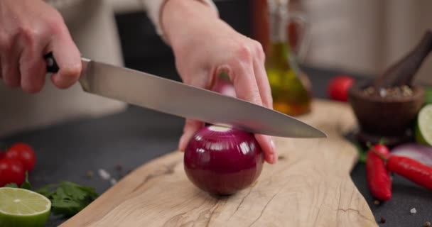 Woman Cuts Red Mars Onion Wooden Cutting Board Domestic Kitchen — Stock Video