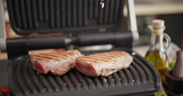 Two Pieces Tuna Steak Grilling Frying Electric Grill Domestic Kitchen — Stock Video