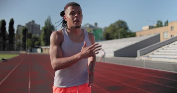 Young African American Runner Athlete Jogging Stadium Slow Motion — Stock Video