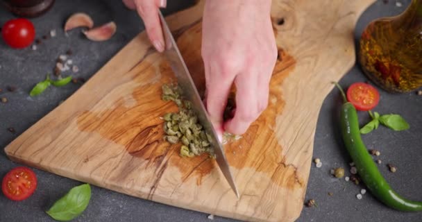 Woman Slicing Chopping Capers Wooden Cutting Board Dci — Stock Video