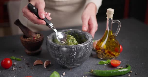 Woman Mixing Green Sauce Stone Marble Mortar Dci — Stock Video