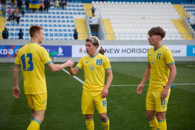Ukraine and Azerbaijan U-21 teams are playing a football match for the UEFA European Qualifiers Euro 2025 in Surakhany, Azerbaijan, on March 26, 2024. In the photo: Volodymyr Saliuk, Maksym Khlan clipart