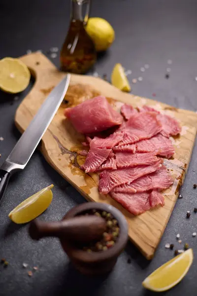 Woman Cut Tuna Steak Slices Wooden Cutting Board Domestic Kitchen — Stock Photo, Image