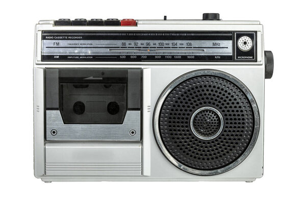 Retro silver tape recorder with radio tuner isolated on a white background