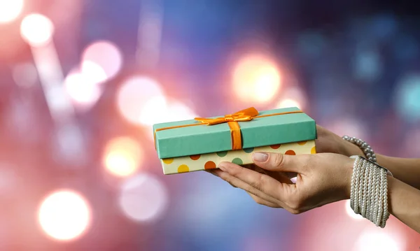 Closeup Hands Giving Surprise Gift Box Mixed Media — Stock Photo, Image