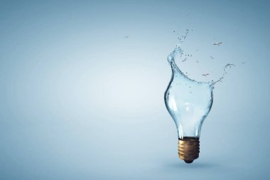 Su sıçramasından çıkan ampul. Karışık ortam