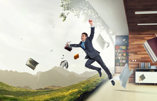 Happy Businessman Jumping High Mixed Media — Stock Photo, Image