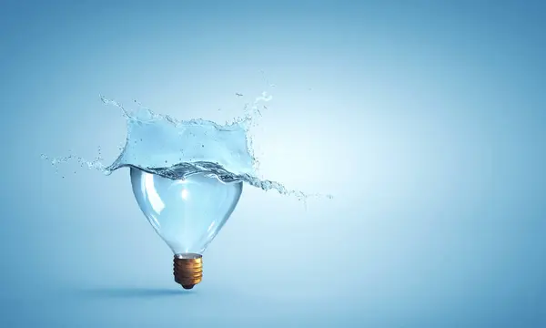 Light Bulb Water Splash Mixed Media Stock Image
