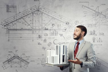 Taslaklar ve planlarla inşaat endüstrisi konsepti. Karışık ortam