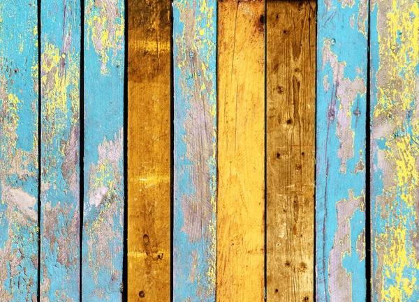 用黄色和蓝色的有裂缝的油漆制成的老式木板的结构 用不同颜色的旧木板做的水平复古背景图 — 图库照片