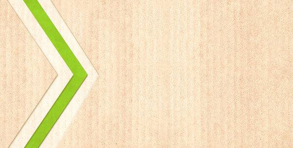 Arrows symbol on recycled striped cardboard texture. Horizontal banner with eco paper texture. Paper cardboard background. Recycled carton material. Ecology and zero waste concept. Copy space for text