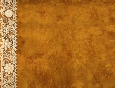 Yatay ya da dikey arkaplan ve grunge eski kirli kağıt dokusu üzerinde dantel kenarlı. Kahverengi kağıt desenli ve çiçekli zarif dantel bantlı klasik arkaplan