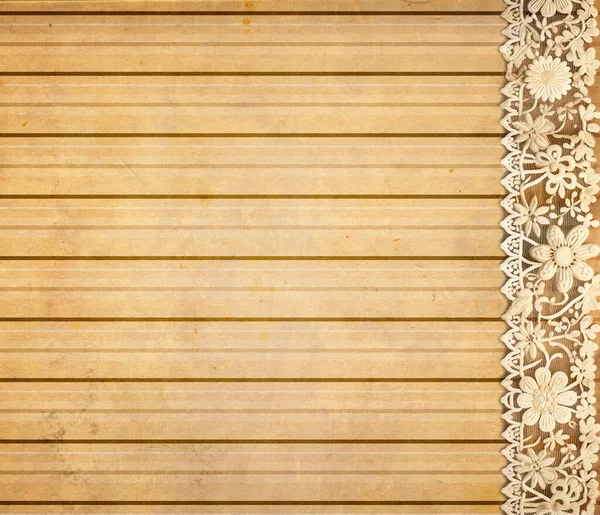 Yatay ya da dikey arkaplan ve grunge eski kirli kağıt dokusu üzerinde dantel kenarlı. Çizgili desenli kağıt desenli klasik arkaplan ve çiçek desenli zarif dantel bant