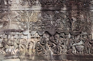 Ünlü Angkor Wat kompleksi, Siem Reap, Kamboçya 'daki Prasat Bayon Tapınağı' nın duvar oyması. Köylülerin günlük rutinlerini tasvir etmek