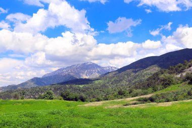 Beautiful landscape in Chimgan mountains, Tashkent region. Aerial view of idyllic mountain scenery in Western Tien Shan Mountains near Charvak Lake, Uzbekistan clipart