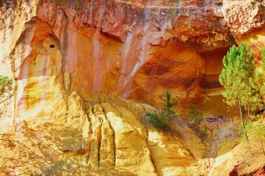 Famous Ochre path (Sentier des Ocres in French) through large ochre deposits in Roussillon, Provence, France