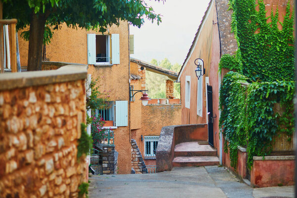 Scenic view of streets of Roussillon, Provence, France. Roussillon is known for its large ochre deposits found in the clay surrounding the village