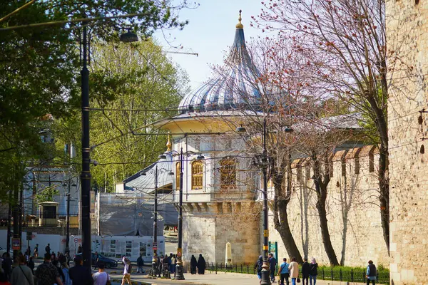 stock image ISTANBUL, TURKEY - APRIL 25, 2023: People walking by a street in Sultanahmet district in Istanbul, Turkey