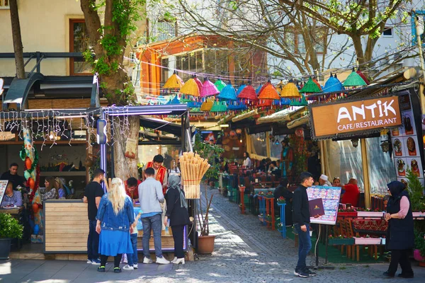 stock image ISTANBUL, TURKEY - APRIL 25, 2023: People walking by a street in Sultanahmet district in Istanbul, Turkey