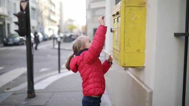 Adorable Preschooler Girl Putting Letter Yellow Post Box Street Paris — Stock Video