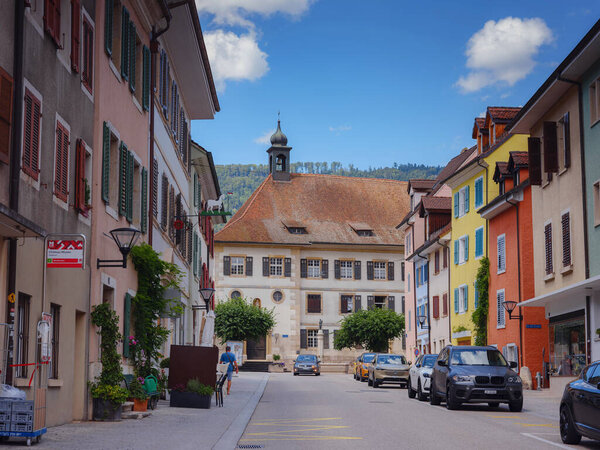 DELEMONT SWITZERLAND, JULY 5, 2022: historical Buildings in the city centre of DELEMONT. walk through city center, facades of residential buildings