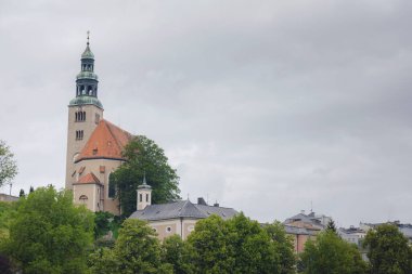 Roman Catholic parish church of Mulln, of Our Lady Mariae Himmelfahrt, also known as Mullner Church, is located on northern foothills of Monchsberg in old suburb of Mulln in city of Salzburg.