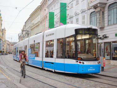 Linz, Austria - August 6, 2022 : public transport in the city. tram on the streets of the city.