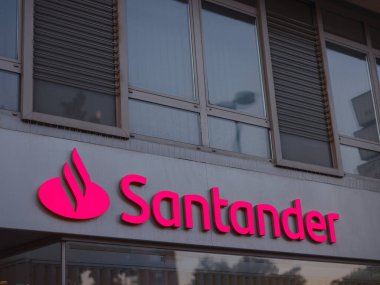 Munich, Germany - August 4, 2022: Santander logo on Santander bank office. Santander is a spanish bank founded in 1857