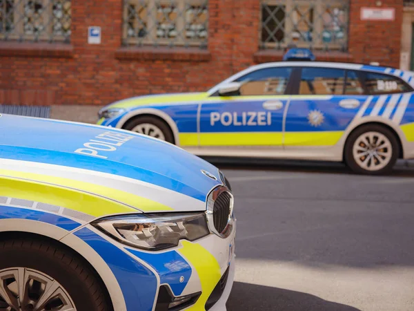 Munich, Germany - August 5, 2022 : german police cars. Police Germany terror attack editorial illustrative image. ISIS, ISIL terrorist threat.