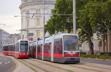 Vienna, Austria - August 7, 2022 : public transport in the city. Tram goes by the street of Vienna. Vienna is a capital and largest city of Austria.