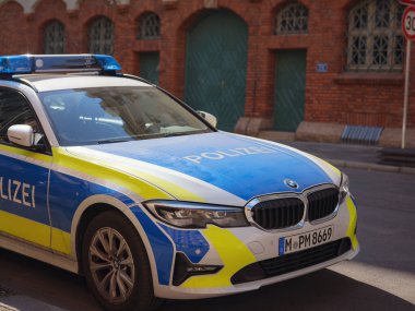 Munich, Germany - August 5, 2022 : german police cars. Police Germany terror attack editorial illustrative image. ISIS, ISIL terrorist threat.