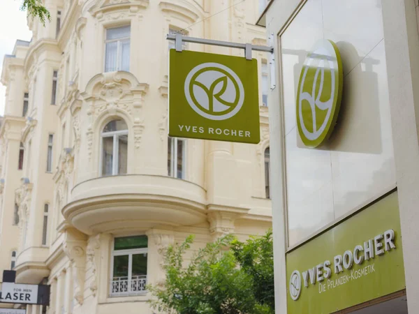 stock image Vienna, Austria - August 7, 2022: Yves Rocher logo and text sign store on shop wall French beauty brand