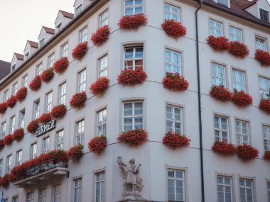 Munich, Bavaria, Germany - August 4, 2022: Hirmer market - Five-storey men's fashion store in wich a variety of brands and models, modern cafe. Marienplatz