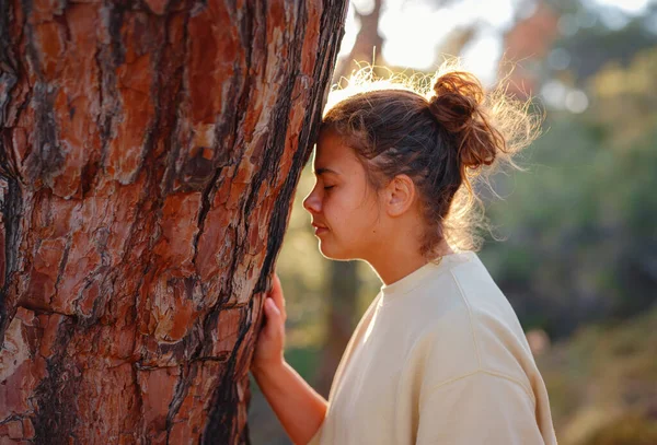 caucasian woman enjoys being in nature, beautiful forest in mountains. embracing fresh air and engaging in outdoor activities. Friluftsliv concept means spending as much time outdoors as possible