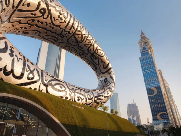 stock image 25 March 2023, Dubai, UAE: Museum of future. Sunset time View. Unique close up perspective. Cityscape skyline. Urban background. tourist trip to futuristic dubai