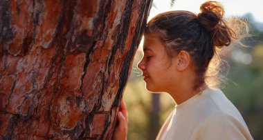 caucasian woman enjoys being in nature, beautiful forest in mountains. embracing fresh air and engaging in outdoor activities. Friluftsliv concept means spending as much time outdoors as possible