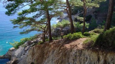 Turkey, trip to city of Kemer, Bay of Big Stones. Travel adventure , active vacations healthy lifestyle and eco tourism concept and idea. tourist woman enjoying beautiful scenery