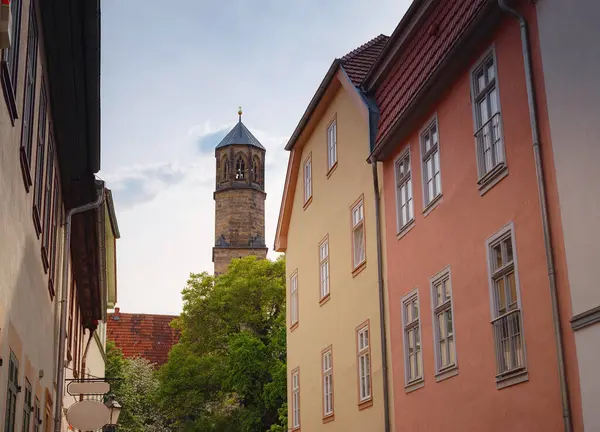 spring trip to Europe. Travel and German sightseeing locations. interesting ancient towers and facades of medieval houses somewhere in Erfurt city