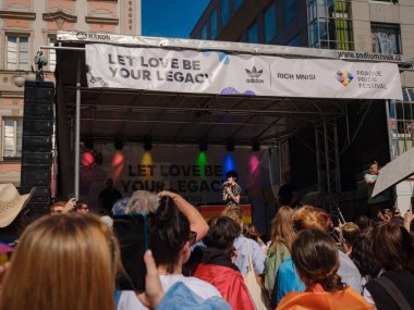 Prague, Czech Republic - August 12, 2023: Prague Pride Festival Parade. main stage of the festival and its spectators, Laura Pergolizzi or LP on stage clipart