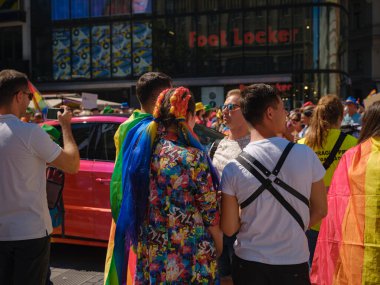 Prague, Czech Republic - August 12, 2023: Prague Pride Festival Parade. bright and happy parade visitors with rainbow and other LGBTQ attributes clipart