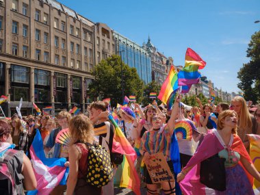 Prague, Czech Republic - August 12, 2023: Prague Pride Festival Parade. bright and happy parade visitors with rainbow and other LGBTQ attributes, crowd enjoys the performance on stage clipart