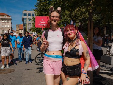 Prague, Czech Republic - August 12, 2023: Prague Pride Festival Parade. bright and happy parade visitors with rainbow and other LGBTQ attributes clipart