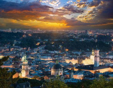 Lvov Skyline in the evening. Picturesque landscape of the old town in the center of Lviv at sunset from High Castle Hill. Lviv, Ukraine