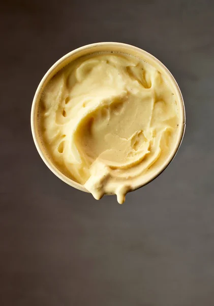 Levitating Paper Cup Melting Vanilla Ice Cream — Stock Photo, Image