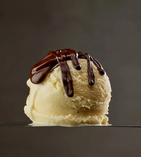 Vanilla Ice Cream Ball Melted Chocolate Dark Grey Background — Zdjęcie stockowe