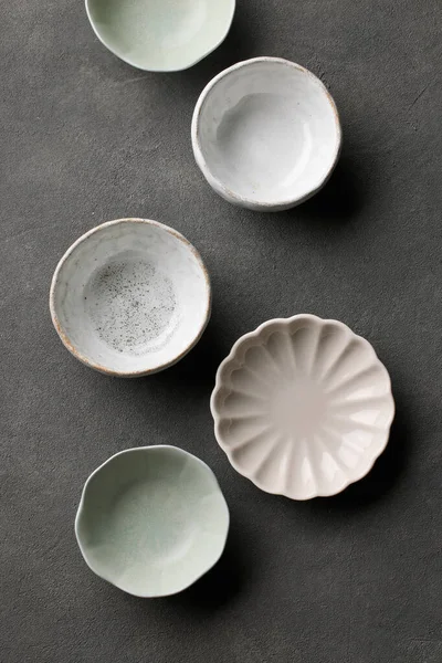 Various Empty Bowls Dark Grey Background Top View — Foto Stock