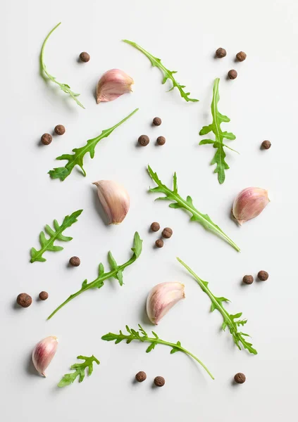 Composition Garlic Rucola Pepper White Background Top View — Stockfoto